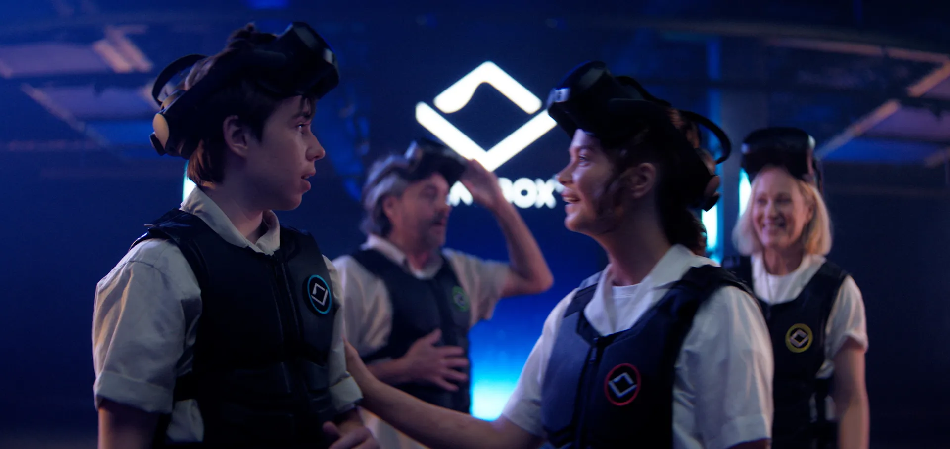 A family in haptic vests and VR headsets