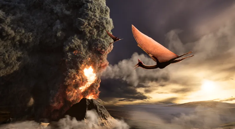A pterosaur flies past an erupting volcano